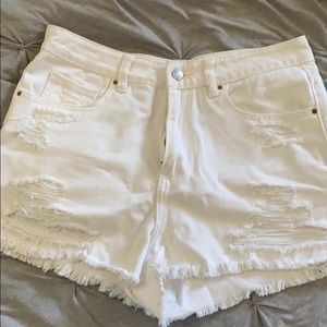 High waisted distressed white mom shorts